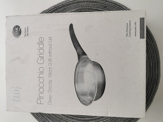 potoria AMC Pinocchio Griddle Pfanne aus Edelstahl mit 16 cm Durchmesser für Induktion auf einer Tischunterlage